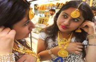 Gold prices marginally improve, silver up Rs 451