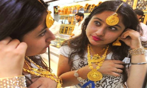 Gold prices marginally improve, silver up Rs 451