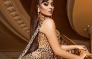 Urvashi Rautela wore a leopard print gown, stood bold on the stairs