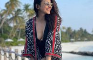 Rakulpreet Singh shared a photo of a pink two-piece floating in the sea, said