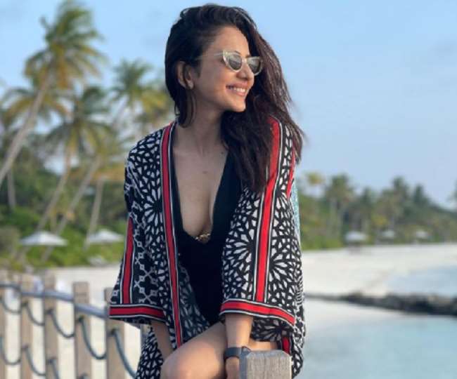 Rakulpreet Singh shared a photo of a pink two-piece floating in the sea, said