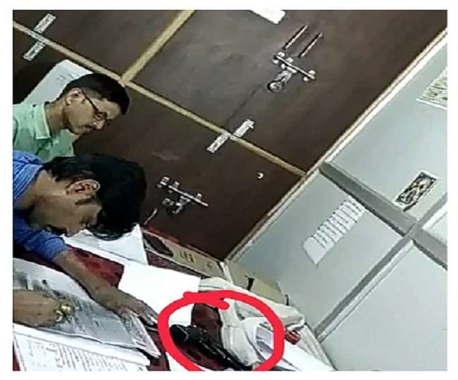 He was treating the patient by keeping a pistol on the table, this action was taken against the government doctor after the video went viral
