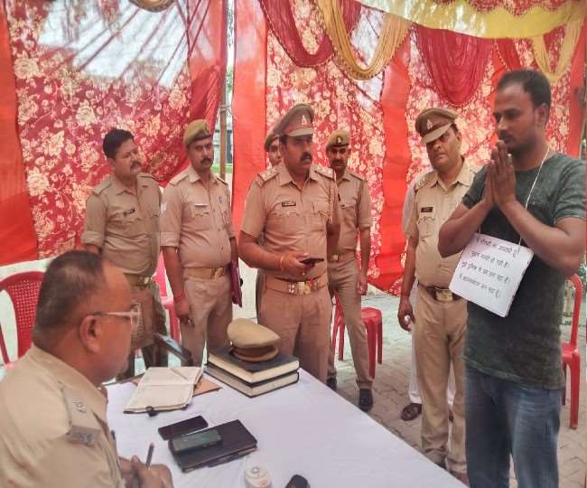 The accused of cow slaughter reached to surrender with folded hands, a placard around his neck, said, I am afraid of UP police