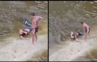 A girl jumped into the river, a young man jumped into the river to save the girl, the fisherman slapped him